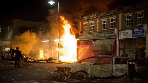 Fires, looting in London riot