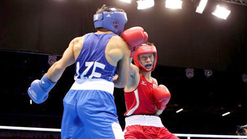 London 2012: more boos as boxer is knocked down five times but wins