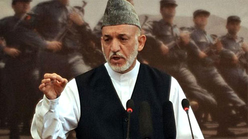 Afghan president warns on immunity for foreign troops