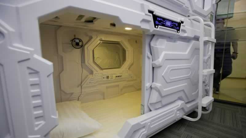 Eyeing sleepy office workers, China's 'sharing economy' opens nap capsule hotels